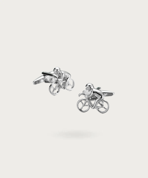 Boutons de manchette 'Tour De France' en argent, représentant un vélo de course avec un cycliste, symbolisant la vitesse, l'endurance et l'élégance.