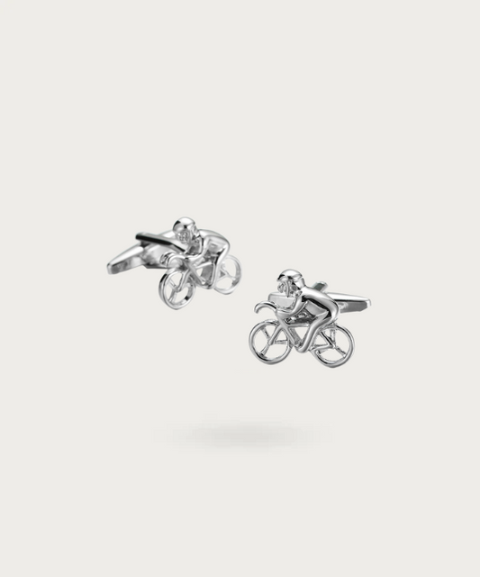 Boutons de manchette 'Tour De France' en argent, représentant un vélo de course avec un cycliste, symbolisant la vitesse, l'endurance et l'élégance.