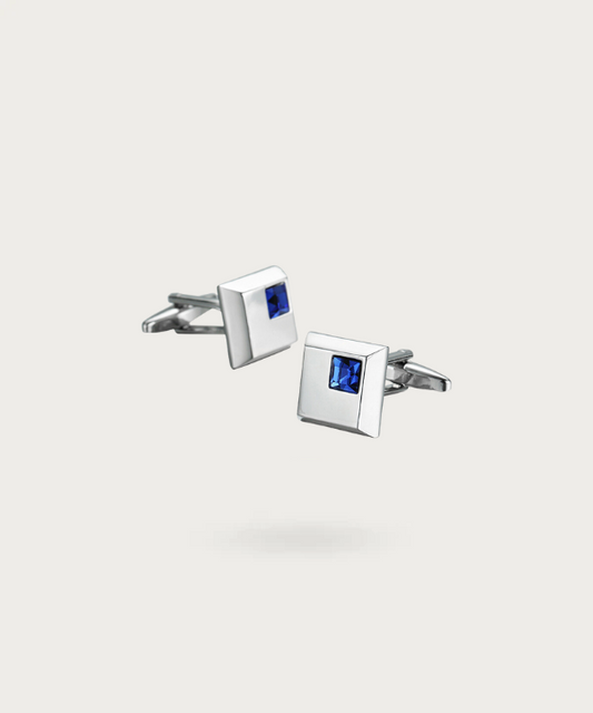 Boutons de manchette de forme carrée avec un intérieur bleu azur, reflétant l'élégance contemporaine et l'odyssée de l'exploration stylistique."