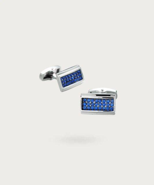 Boutons de manchette en forme de rectangle avec brillants bleus enchâssés, incarnant l'éclat et la majestuosité de l'éternité bleue.