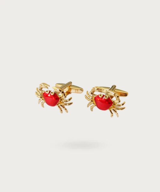 "Bouton de manchette crabe rouge avec détails dorés"