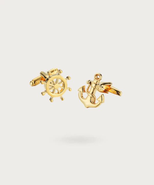 Boutons de manchette qui représente une ancre et un gouvernail de couleur or