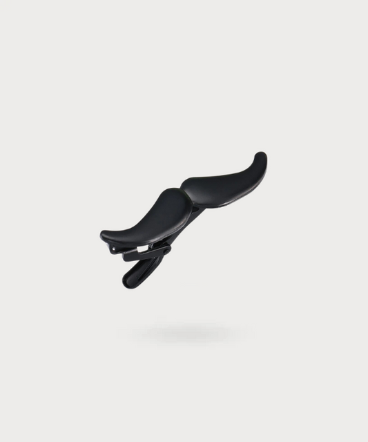 Pince à cravate originale en forme de moustache noire - Élégance Moustachue