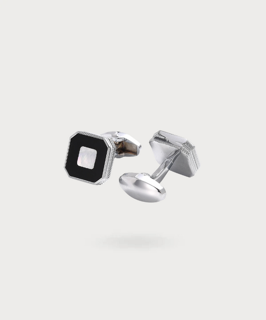 "Boutons de Manchette Dualité Chic en acier inoxydable, mettant en vedette un design carré avec une finition noire et argentée."